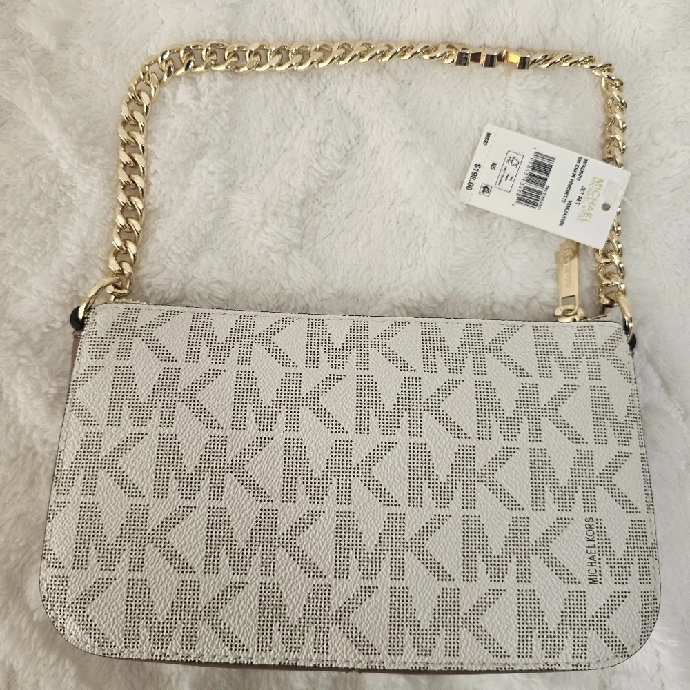 This is‎ a Michael Kors Jet Set Small Chain Pouchette in vanilla/lugg color.